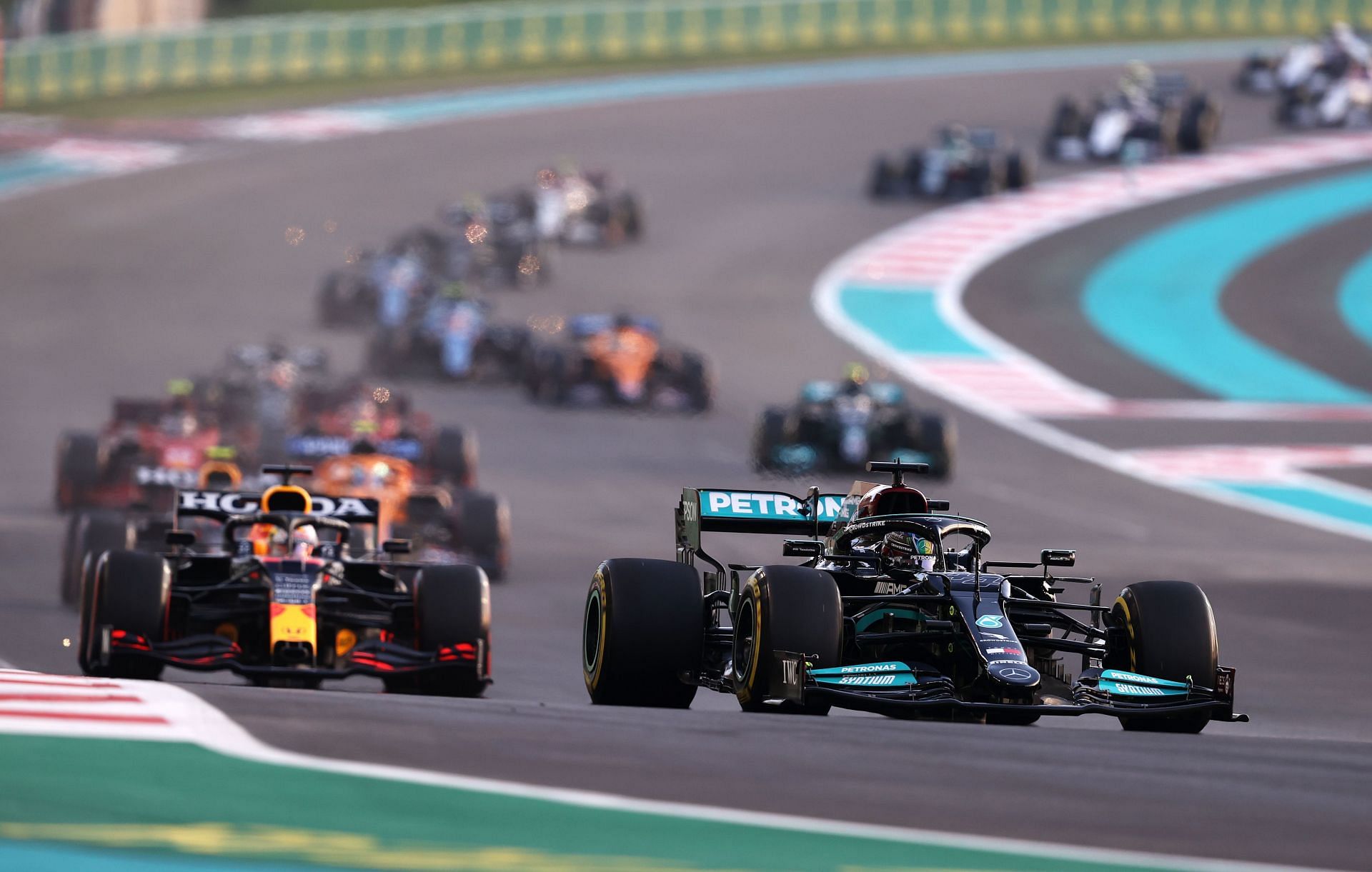 Lewis Hamilton (right) leads Max Verstappen (left) at the 2021 Abu Dhabi Grand Prix