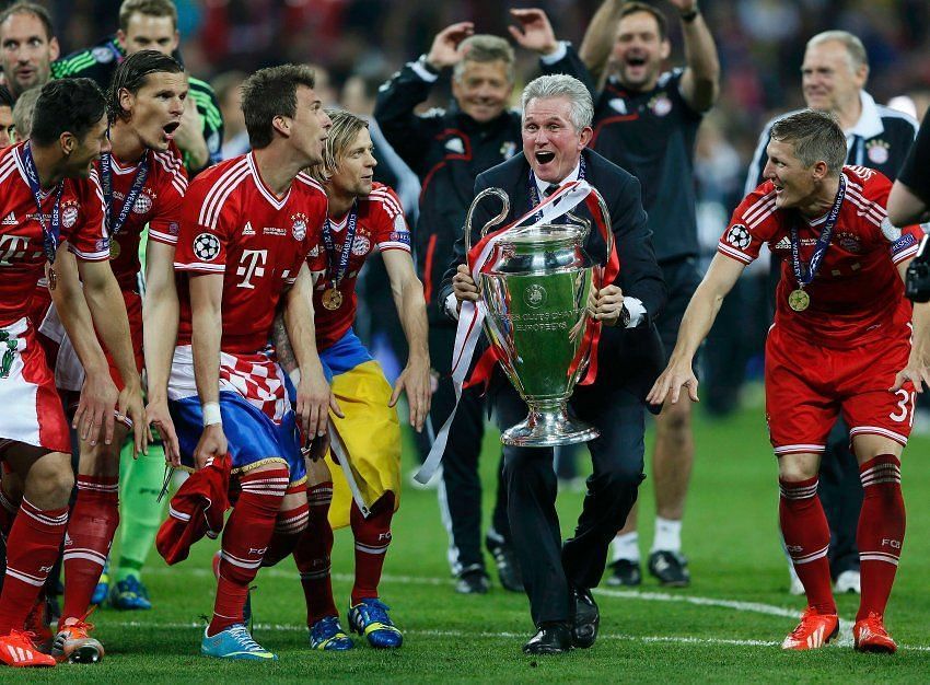 Manager Jupp Heynckes celebrates winning the 2013 Champions League with his Bayern Munich players.