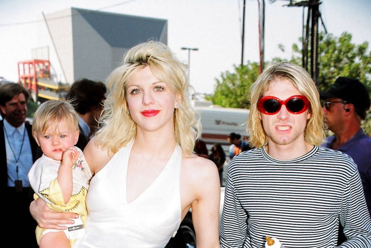 Courtney Love, Kurt Cobain and their daughter Frances Bean Cobain (Image via Getty Images)