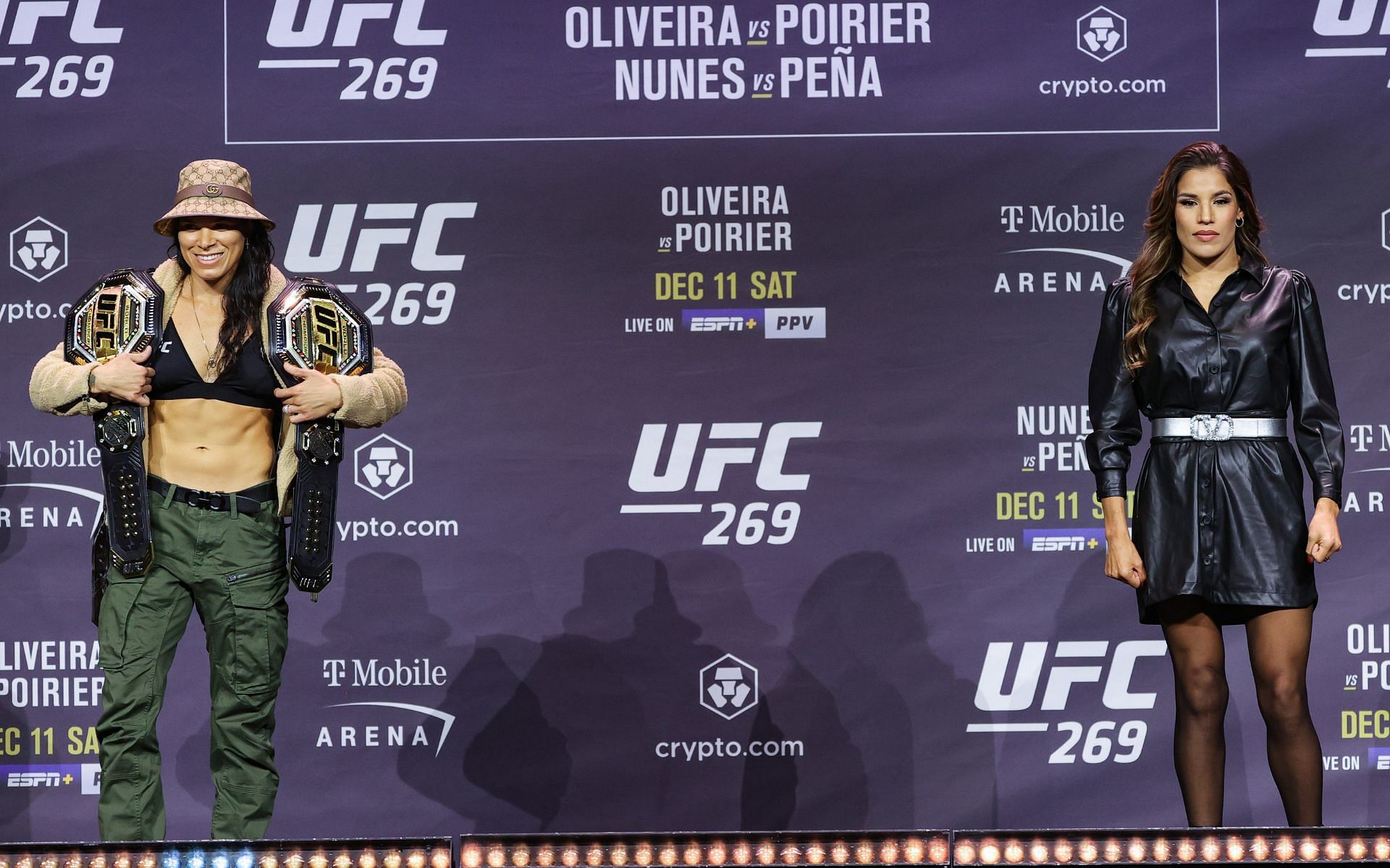 Amanda Nunes (left) and Julianna Pena (right) pose for the media after the UFC 269 press conference