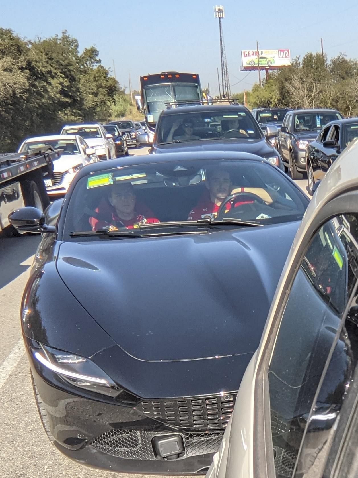 Charles Leclerc stuck in traffic before FP1 of USGP. Taken from r/FormulaOne on Reddit. Posted by u/nyuncat