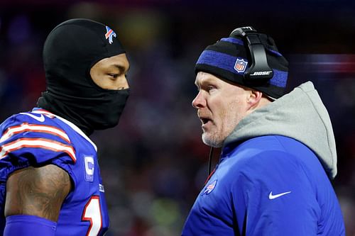 Stefon Diggs and Sean McDermott talk on the Buffalo Bills sideline.