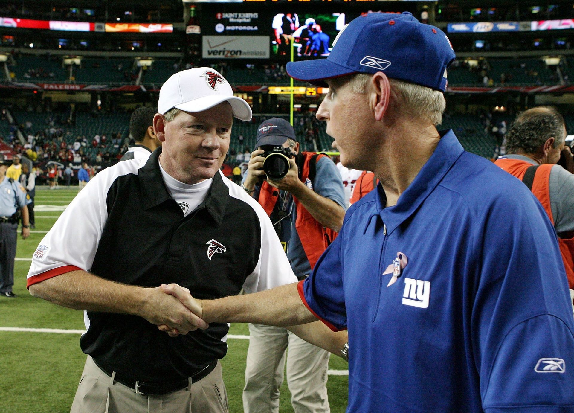 Bobby Petrino greets NY Giants head coach Tom Coughlin after one of his 10 losses as the Atlanta Falcons&#039; boss (Photo: Getty)