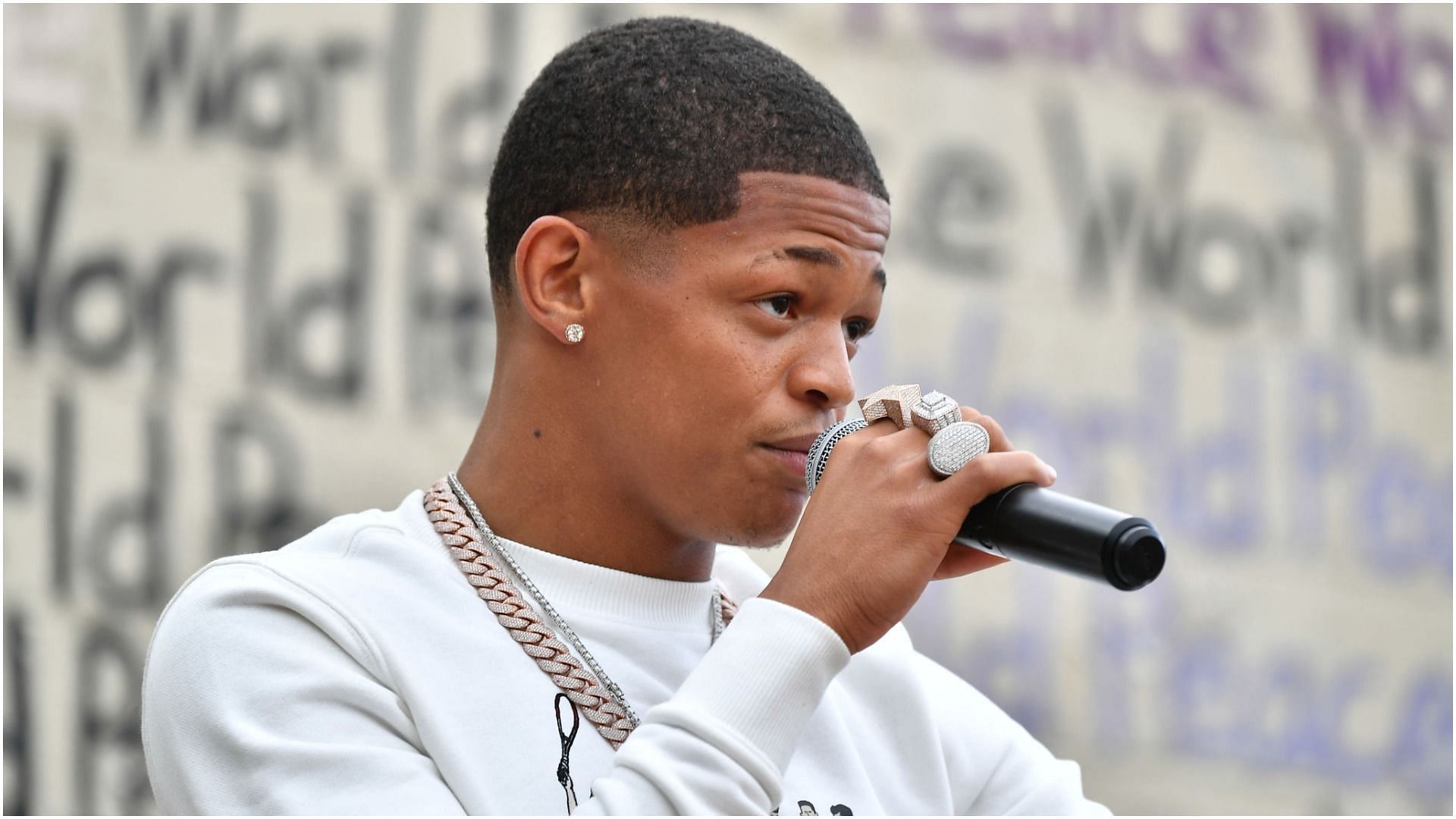 YK Osiris speaks onstage during Juneteenth Voter Registration Concert &amp; Rally at Murphy Park Fairgrounds (Image by Paras Griffin via Getty Images)