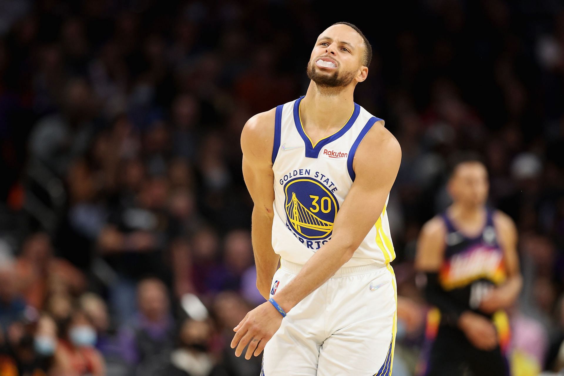 Stephen Curry #30 of the Golden State Warriors reacts after a missed shot against the Phoenix Suns 