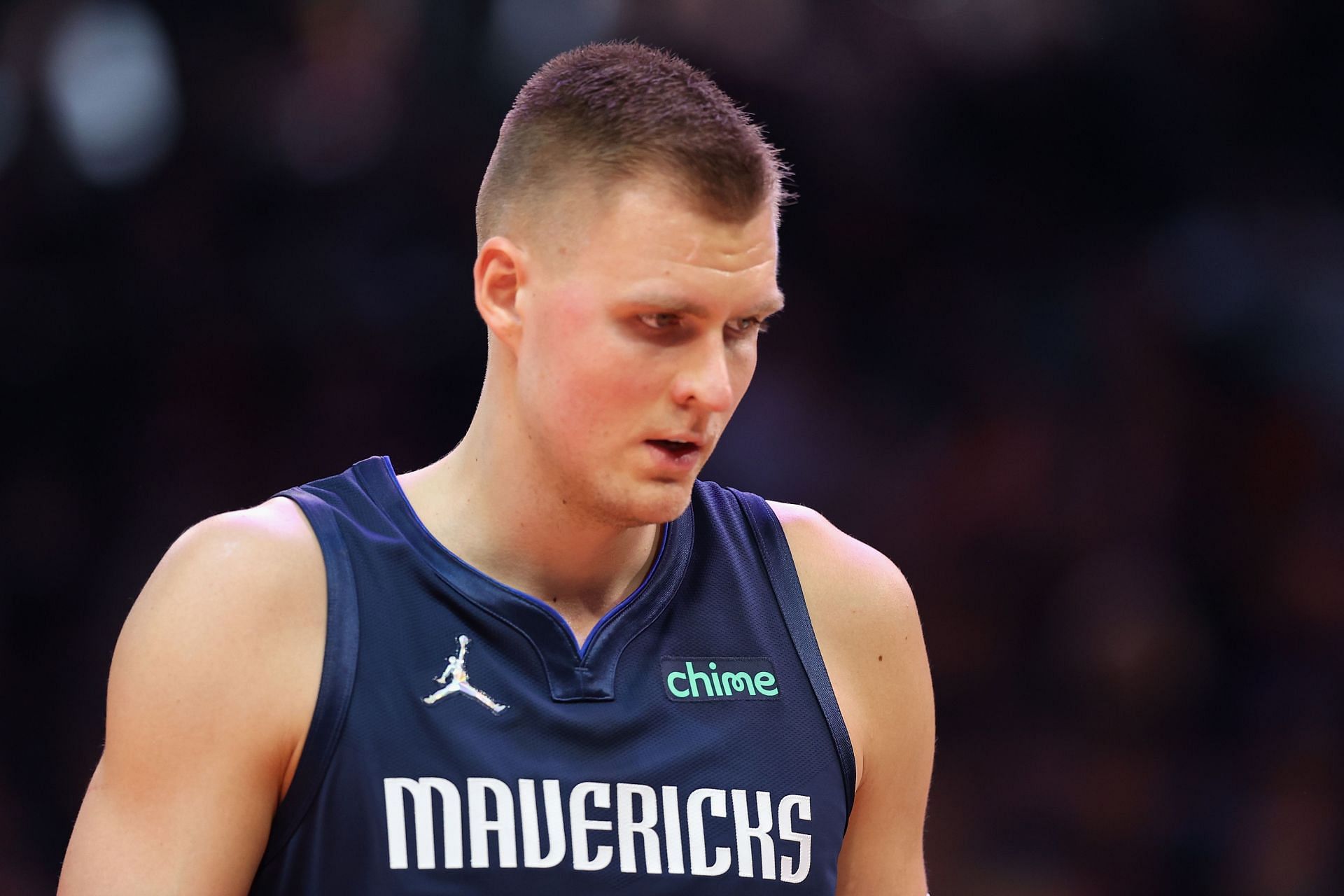 Kristaps Porzingis looks on during a Dallas Mavericks game