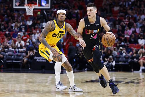 Miami Heat guard Tyler Herro and Utah Jazz guard Jordan Clarkson battle for the Sixth Man of the Year