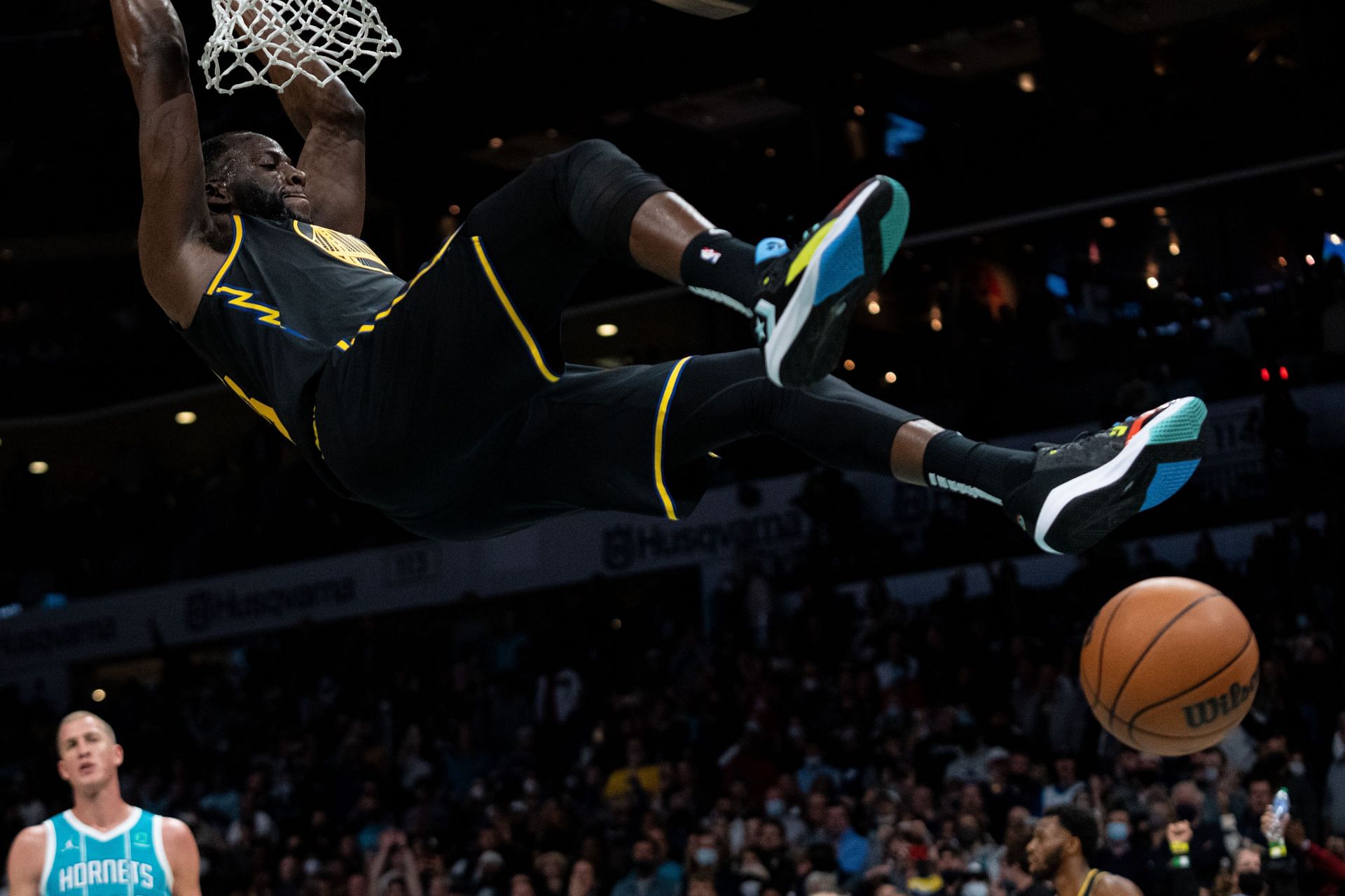 Draymond Green in action for the Golden State Warriors during an NBA game.