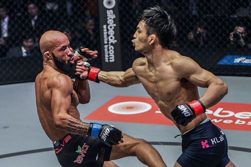 Yuya Wakamatsu (right) received valuable advice from MMA GOAT Demetrious Johnson (left). [Photo: ONE Championship]