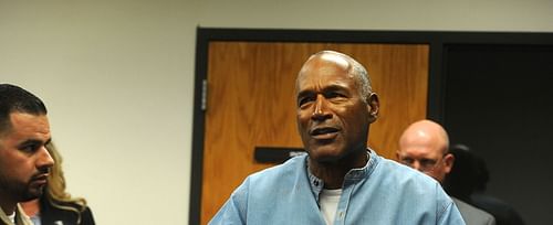 OJ Simpson was deemed a "free man" after getting an early release from parole sentence (Image via Jason Bean-Pool/Getty Images)