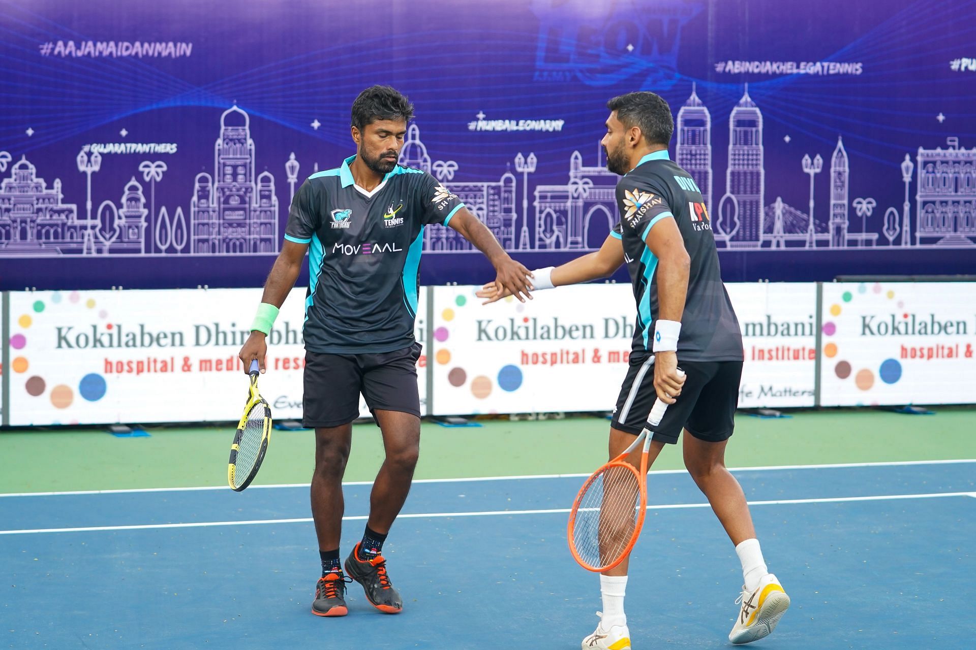 Vijay Sundar (left) and Dhivij Sharan in action for Gujarat Panthers