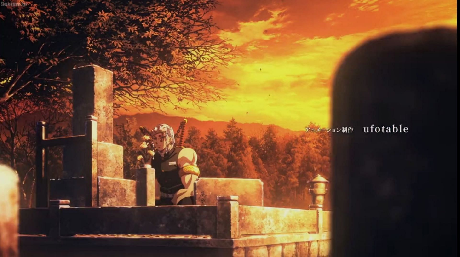 Uzui in front of a grave in the Entertainment District arc (Image via Ufotable)