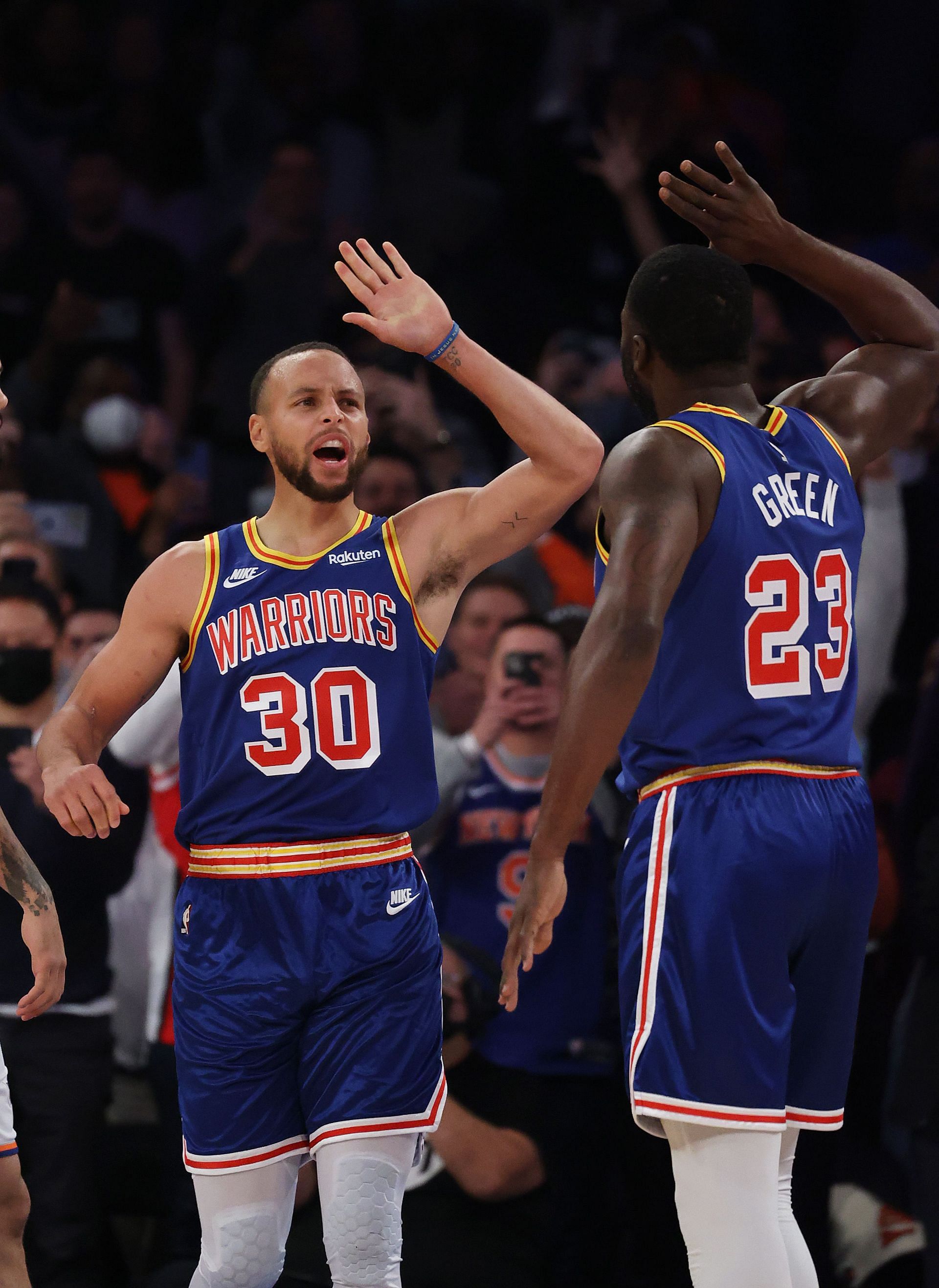 Stephen Curry (30) of the Golden State Warriors celebrates with Draymond Green