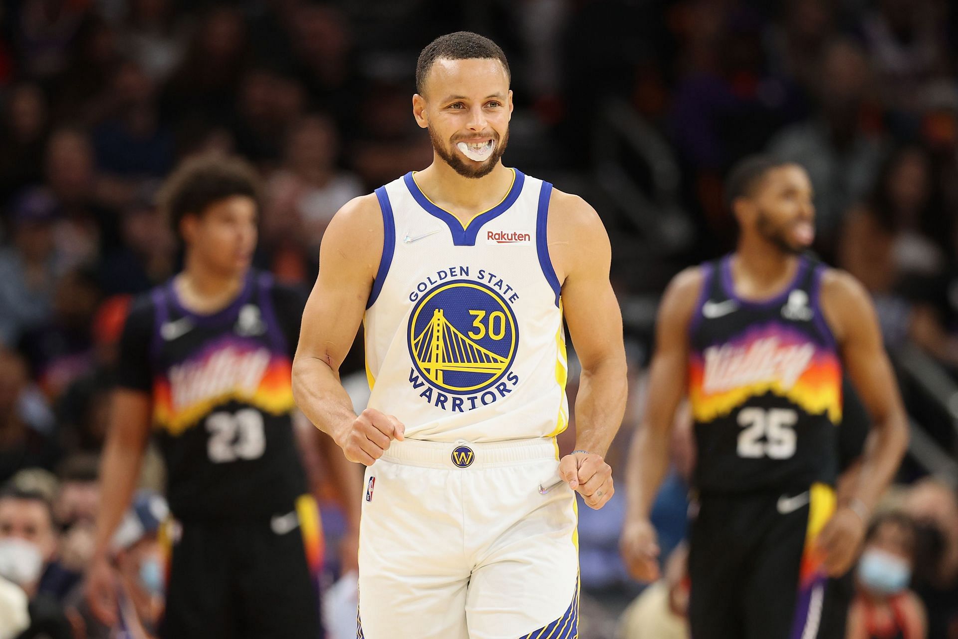 Steph Curry #30 of the Golden State Warriors reacts during the second half of the NBA game at Footprint Center on November 30, 2021 in Phoenix, Arizona.