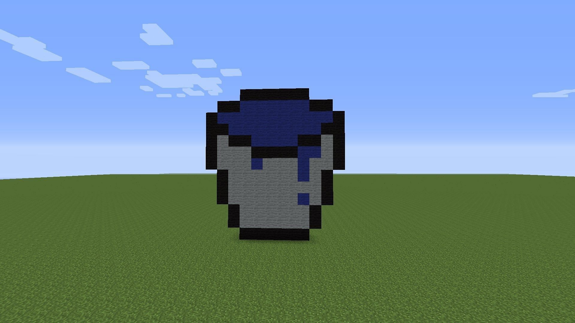 A water bucket in Minecraft (Image via Minecraft)