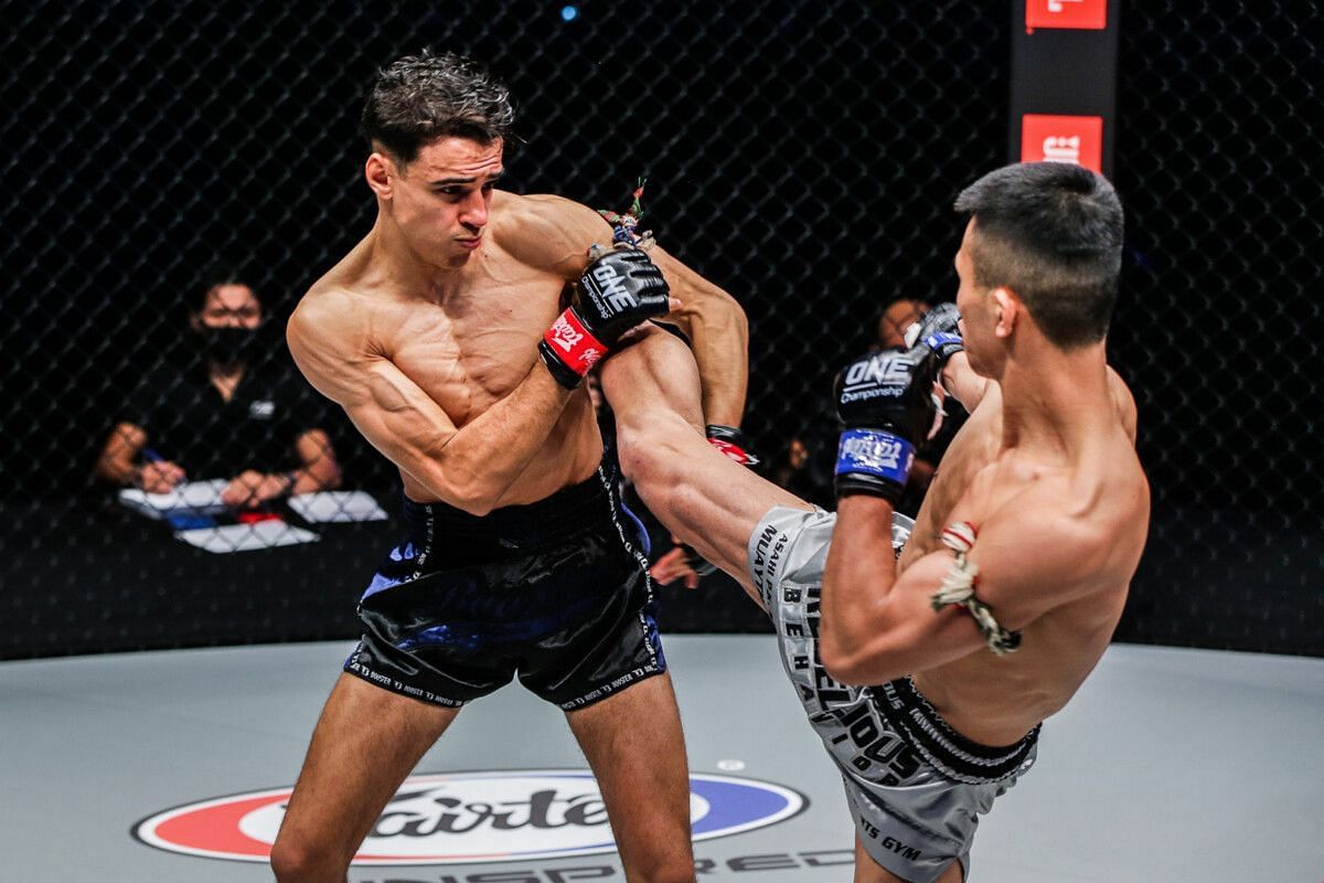 Joseph Lasiri (left) earns knockout win against Asahi Shinagawa (right). [Photo: ONE Championship]