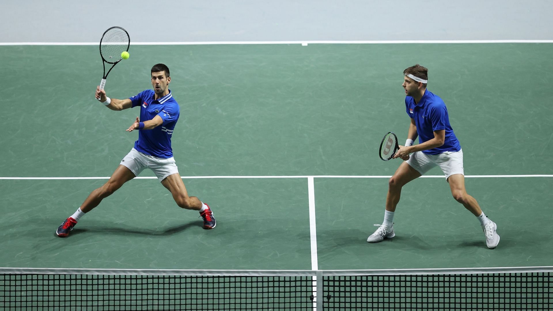 Novak Djokovic and Filip Krajinovic at the 2021 Davis Cup.