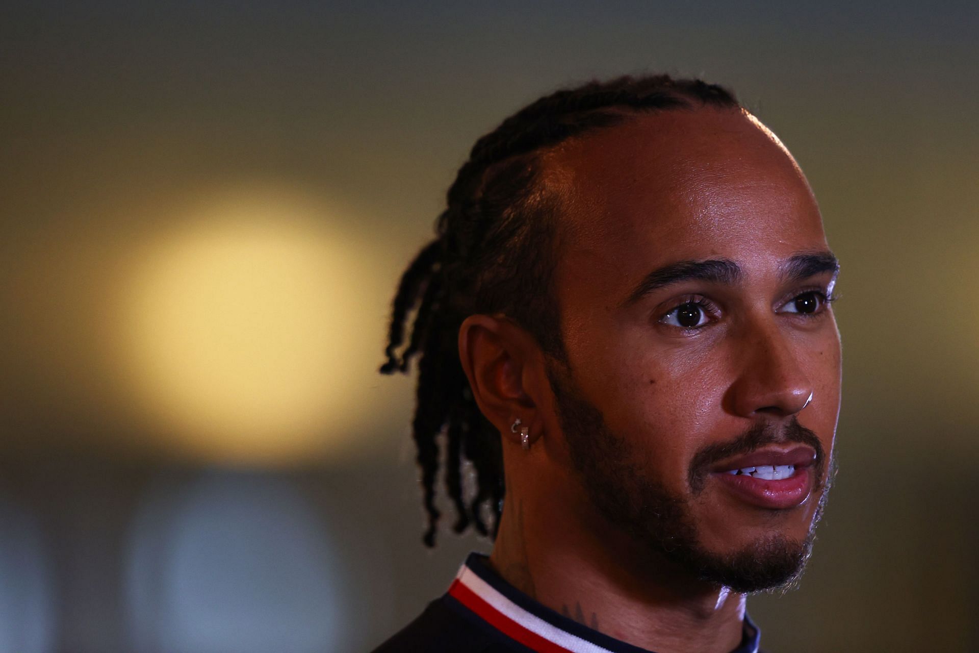 Lewis Hamilton talks to the media in the Paddock during previews ahead 2021 Abu Dhabi GP. (Photo by Bryn Lennon/Getty Images)