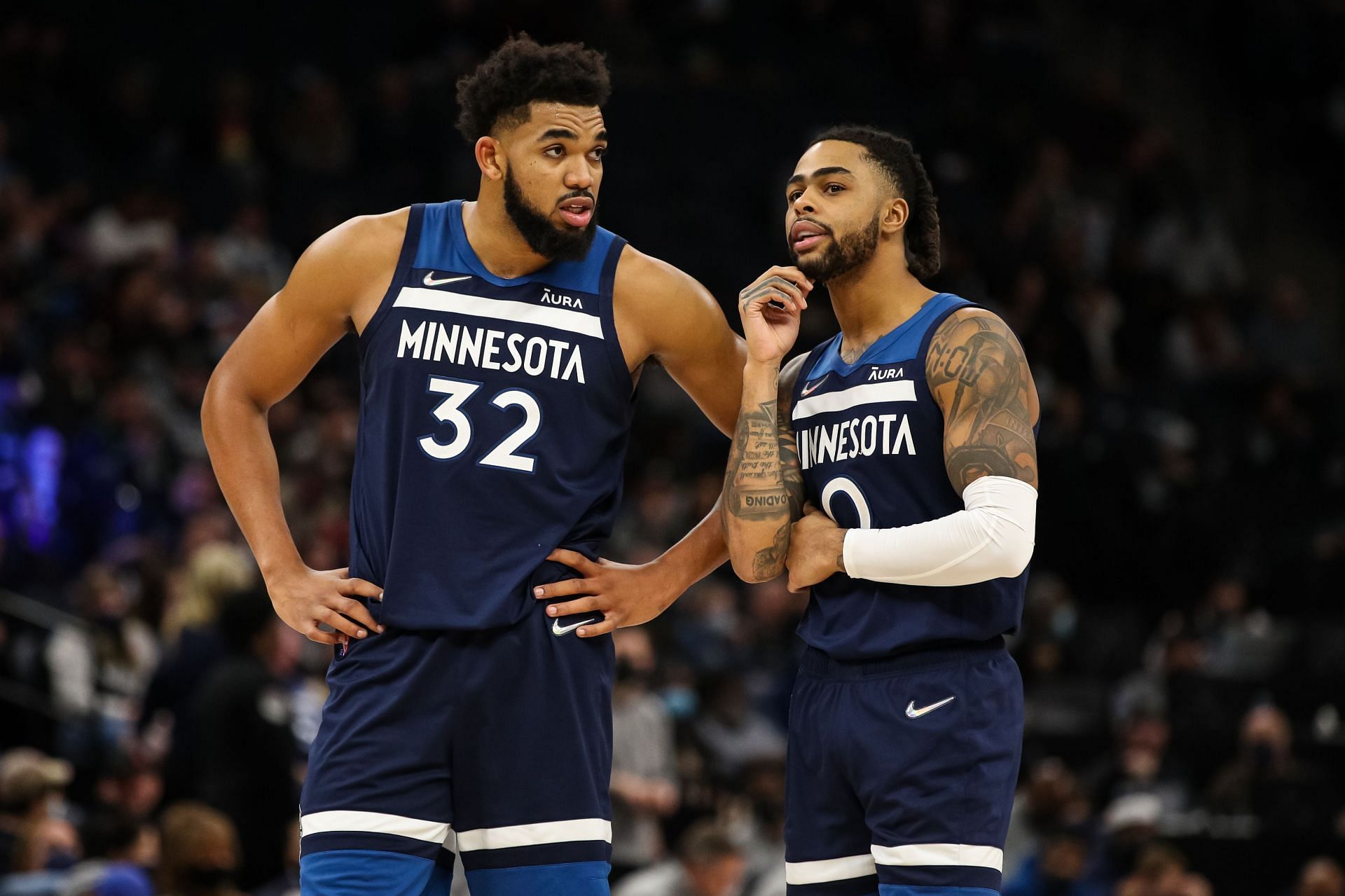 Karl-Anthony Towns and D&#039;Angelo Russell look on at the Minnesota Timberwolves game