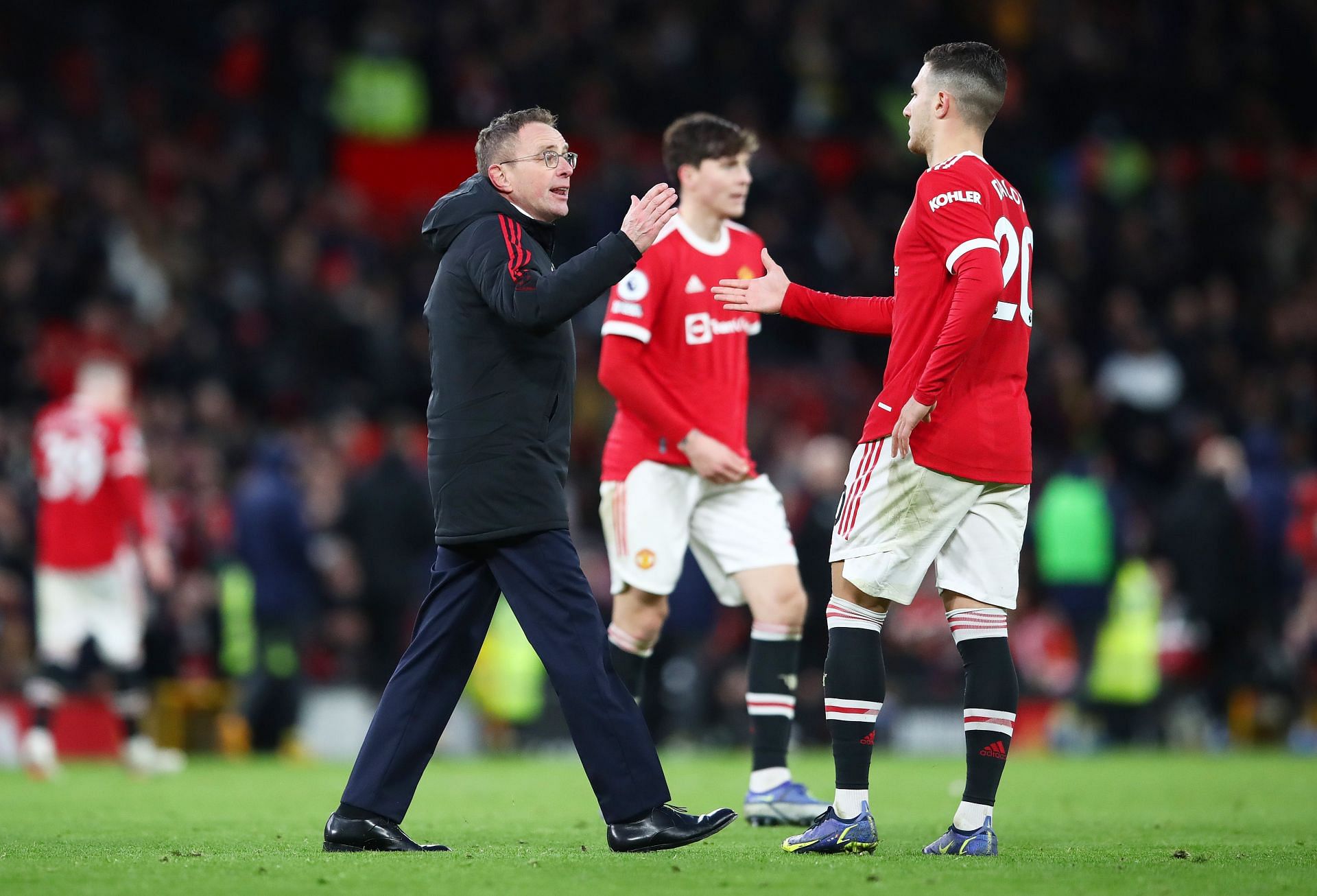 Manchester United manager Ralf Rangnick greets Diogo Dalot
