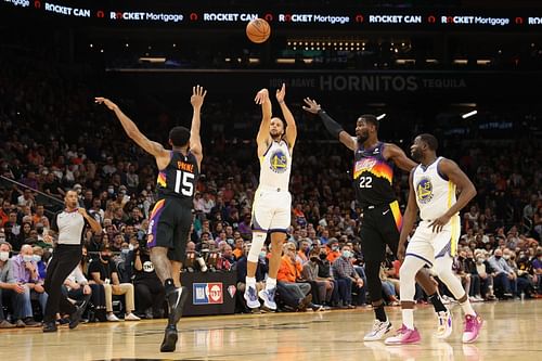 Stephen Curry attempts a three-pointer against the Phoenix Suns