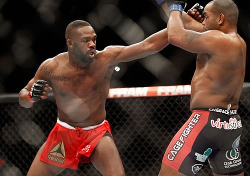 Jon Jones (L) takes on Daniel Cormier (R) at UFC 182