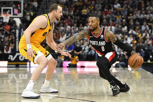 Damian Lillard of the Portland Trail Blazers against Utah Jazz' Joe Ingles