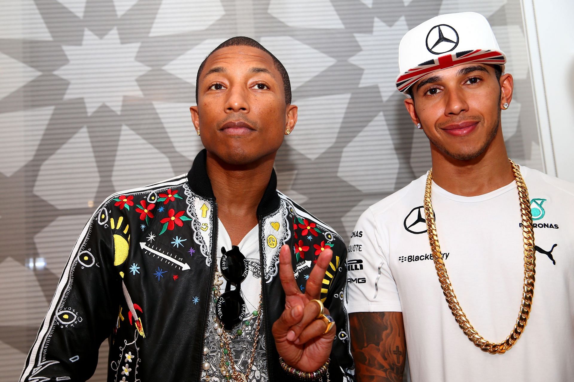 Lewis Hamilton (right) with Pharrell Williams during the 2021 Abu Dhabi Grand Prix