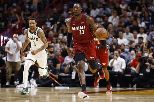 Bam Adebayo #13 of the Miami Heat dribbles up the court