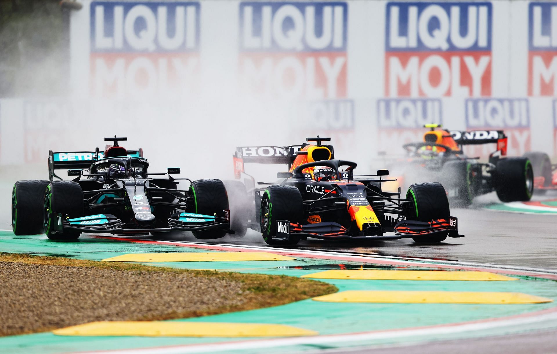 Lewis Hamilton (left) and Max Verstappen (right) at the Emilia Romagna Grand Prix. Photo by Bryn Lennon/Getty Images)