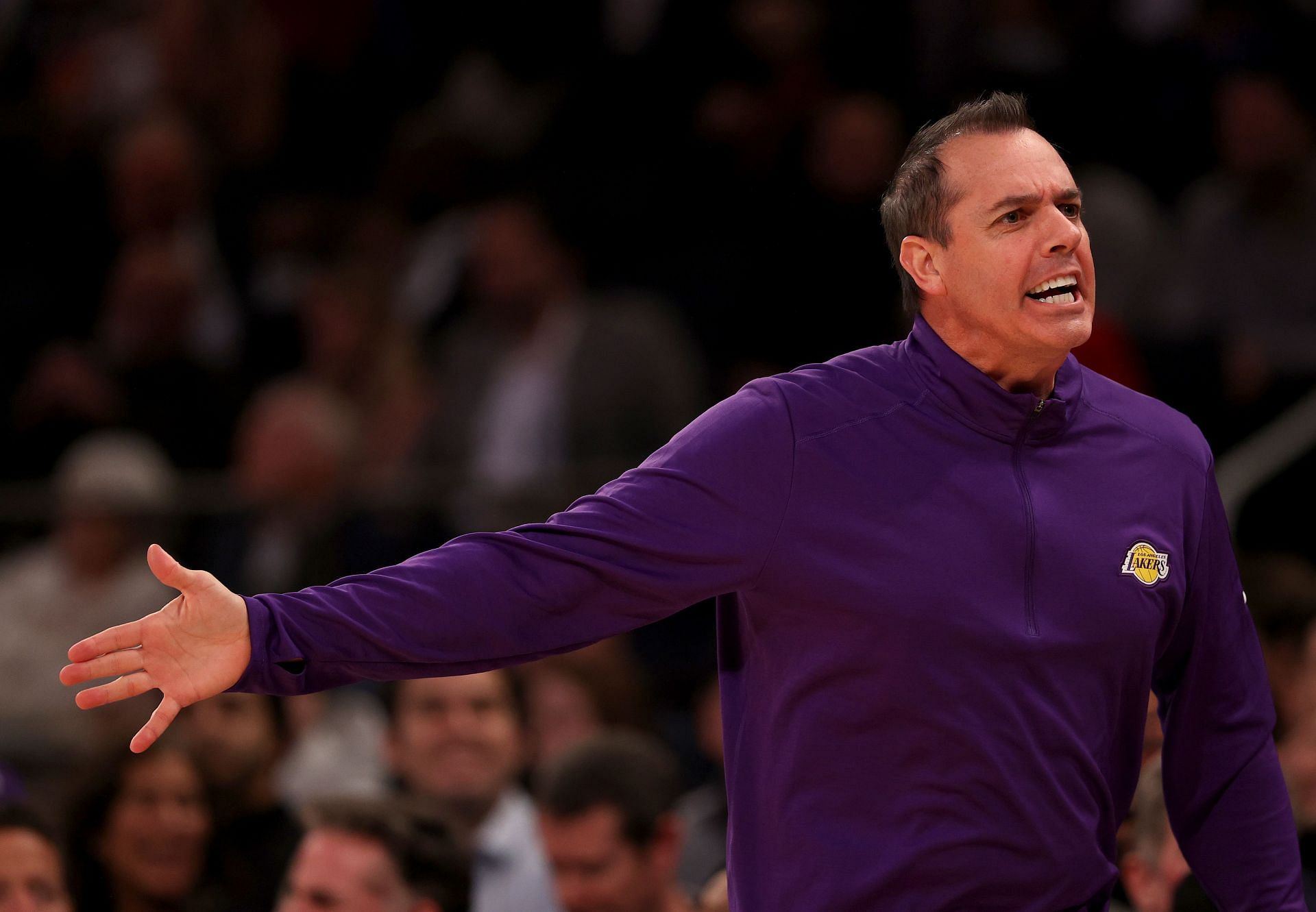 LA Lakers head coach Frank Vogel reacts to a foul call during a game