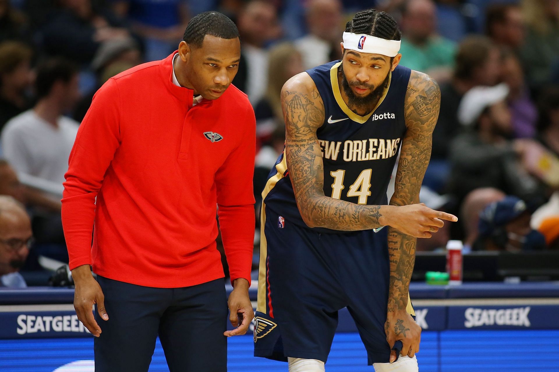 Head coach Willie Green and Brandon Ingram of the New Orleans Pelicans.
