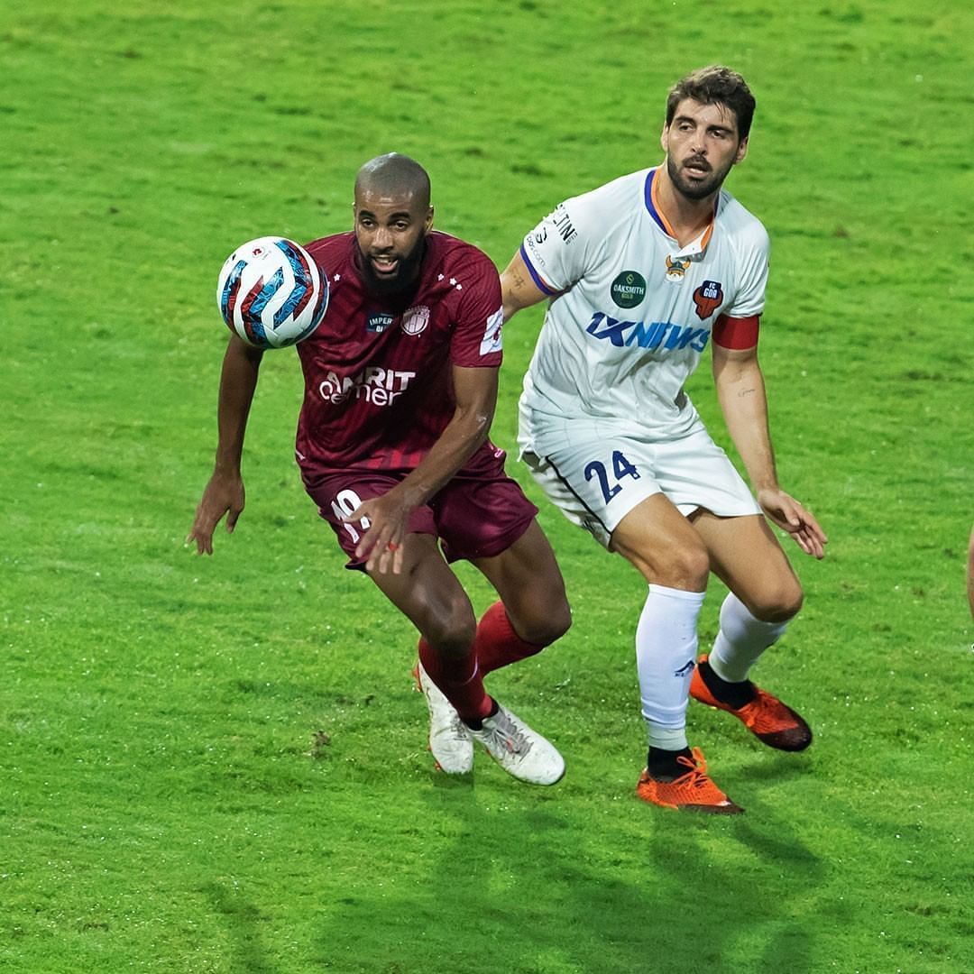 NorthEast United FC&#039;s Mathias Coureur against FC Goa defender Ivan Gonzalez (Image Courtesy: NEUFC Instagram)
