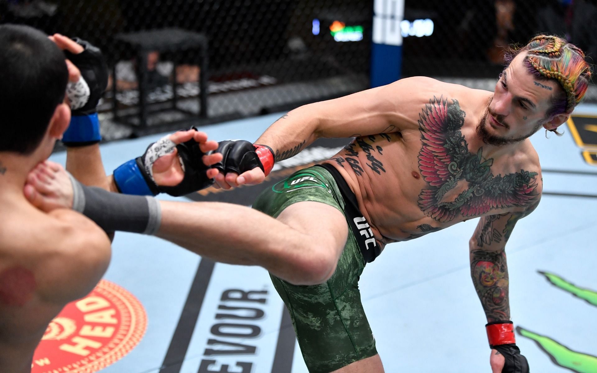 UFC bantamweight sensation Sean O&#039;Malley (right) executes a kick against Thomas Almeida at UFC 260