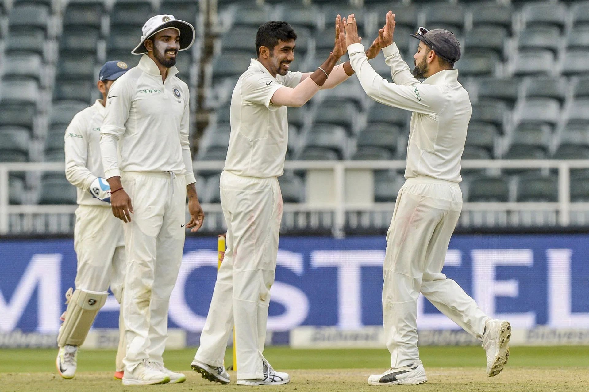 Jasprit Bumrah celebrates a wicket with Virat Kohli. Pic: Getty Images