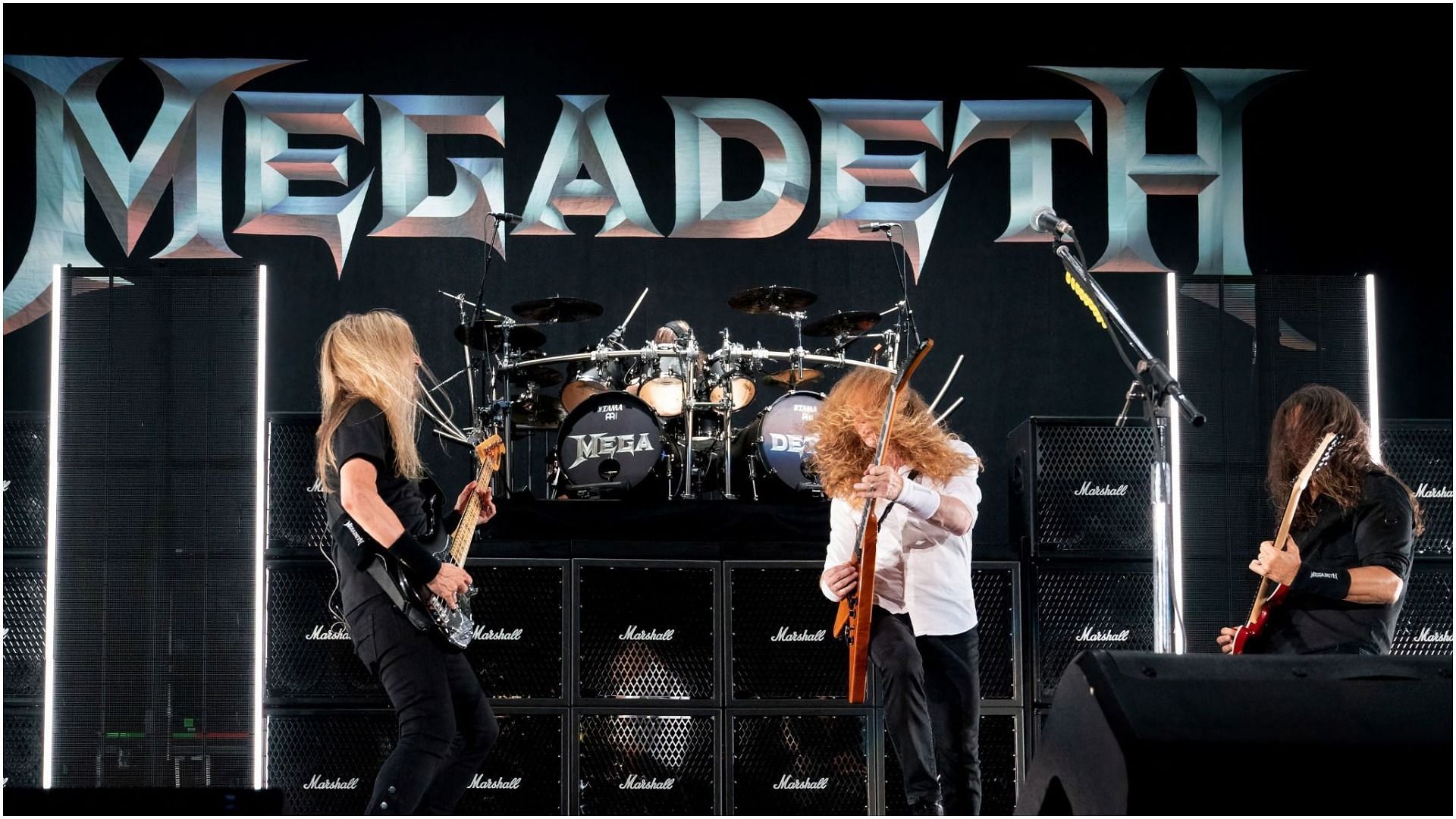 James Lomenzo, Dave Mustaine, and Kiko Loureiro of Megadeth performs on stage at the Germania Insurance Amphitheater in Austin, Texas (Image by Suzanne Cordeiro via Getty Images)