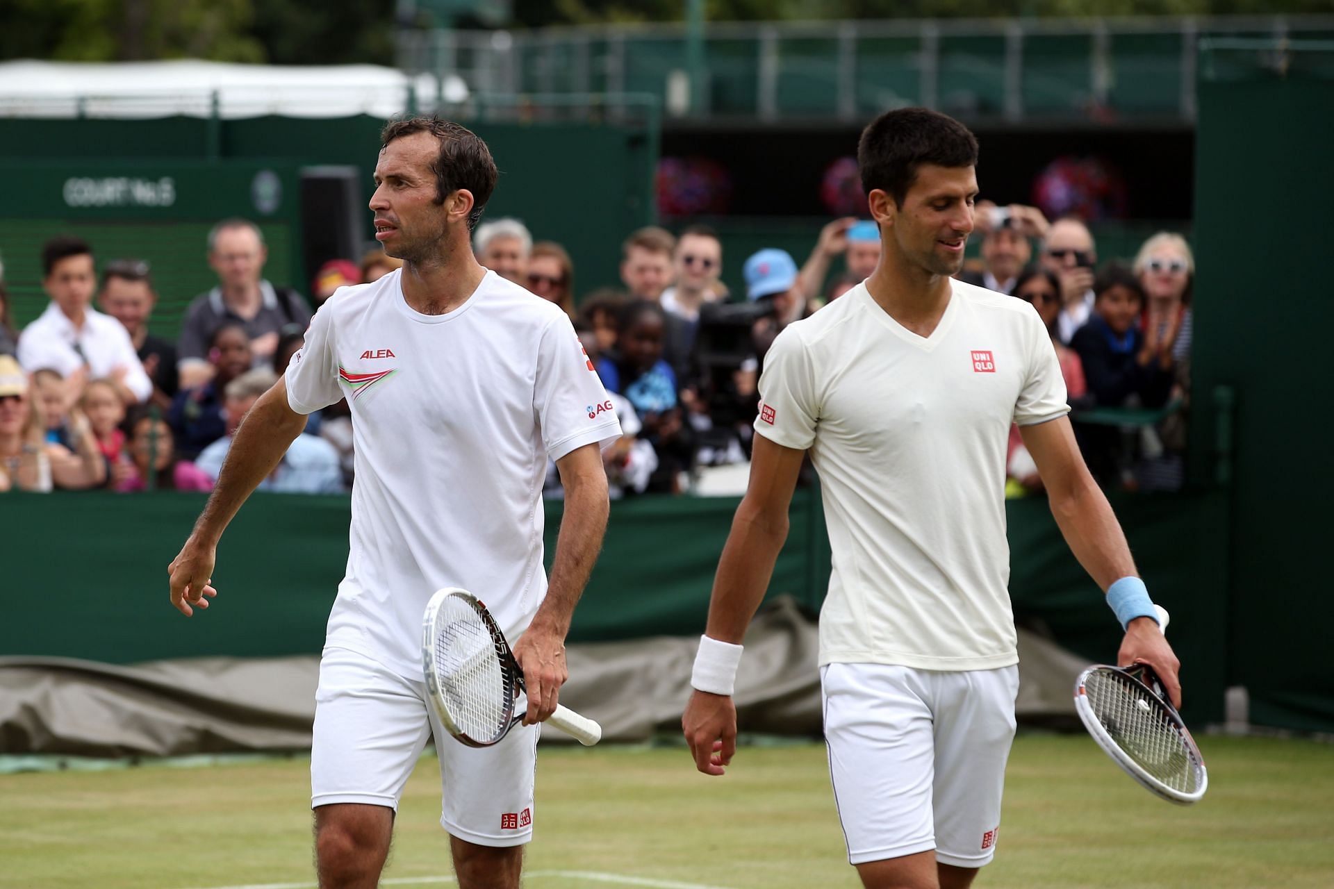 Radek Stepanek training with Novak Djokovic at Wimbledon 2014