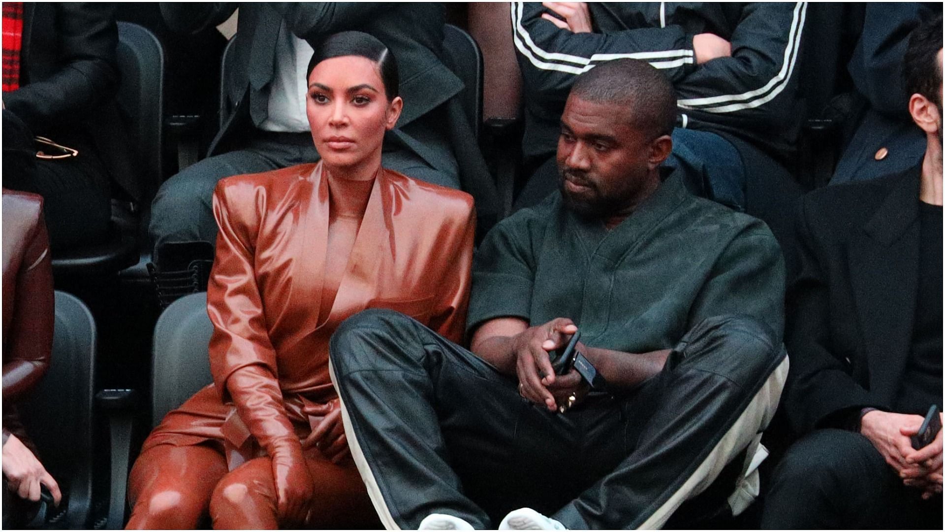 Kim Kardashian and Kanye West attend the Balenciaga show (Image via Pierre Suu/Getty Images)