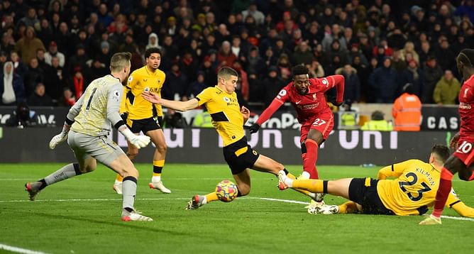 Origi comes up clutch for Liverpool as Reds beat stubborn Wolves to keep title momentum going