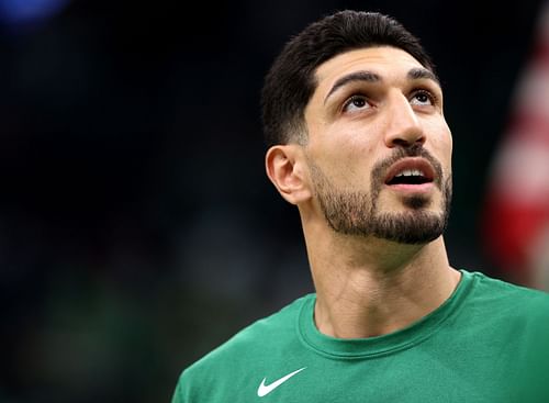 Enes Kanter #13 of the Boston Celtics looks on before during the Celtics home opener against the Toronto Raptors at TD Garden on October 22, 2021 in Boston, Massachusetts.