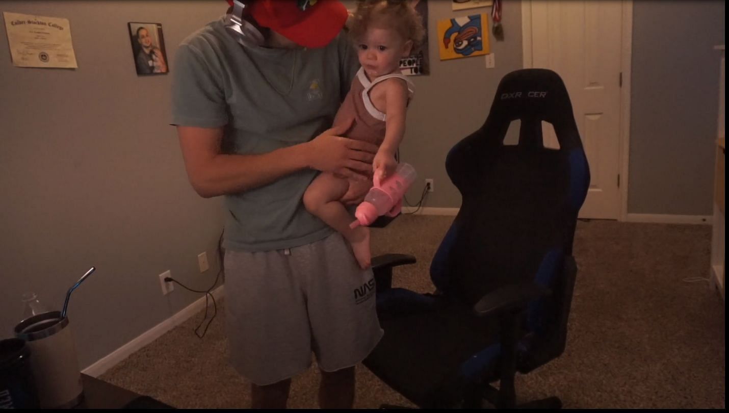 Erobb221 was hilariously trolled by his infant daughter during a recent Twitch stream. (Image via Erobb221, Twitch)