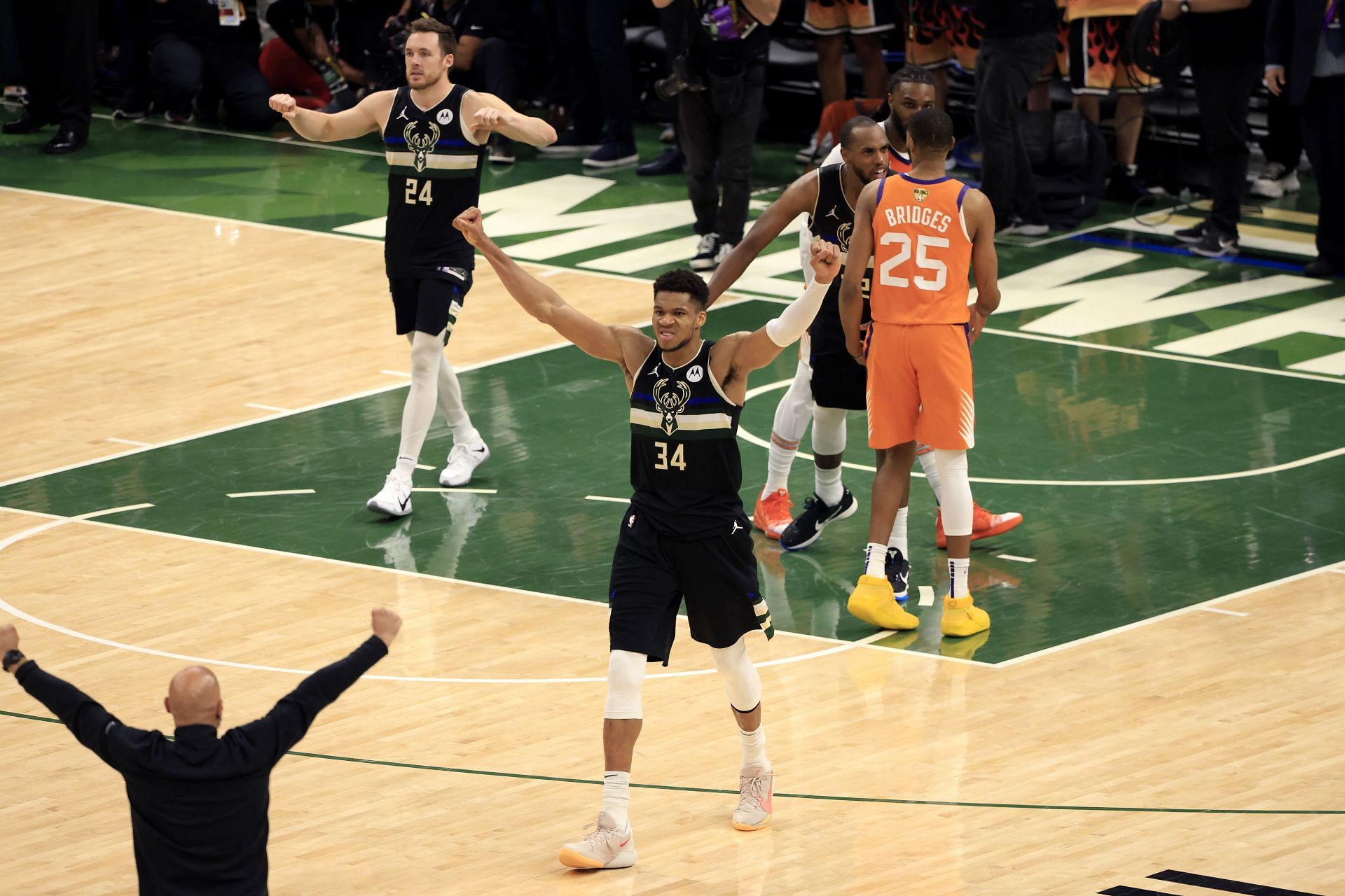 Giannis Antetokounmpo #34 of the Milwaukee Bucks celebrates.