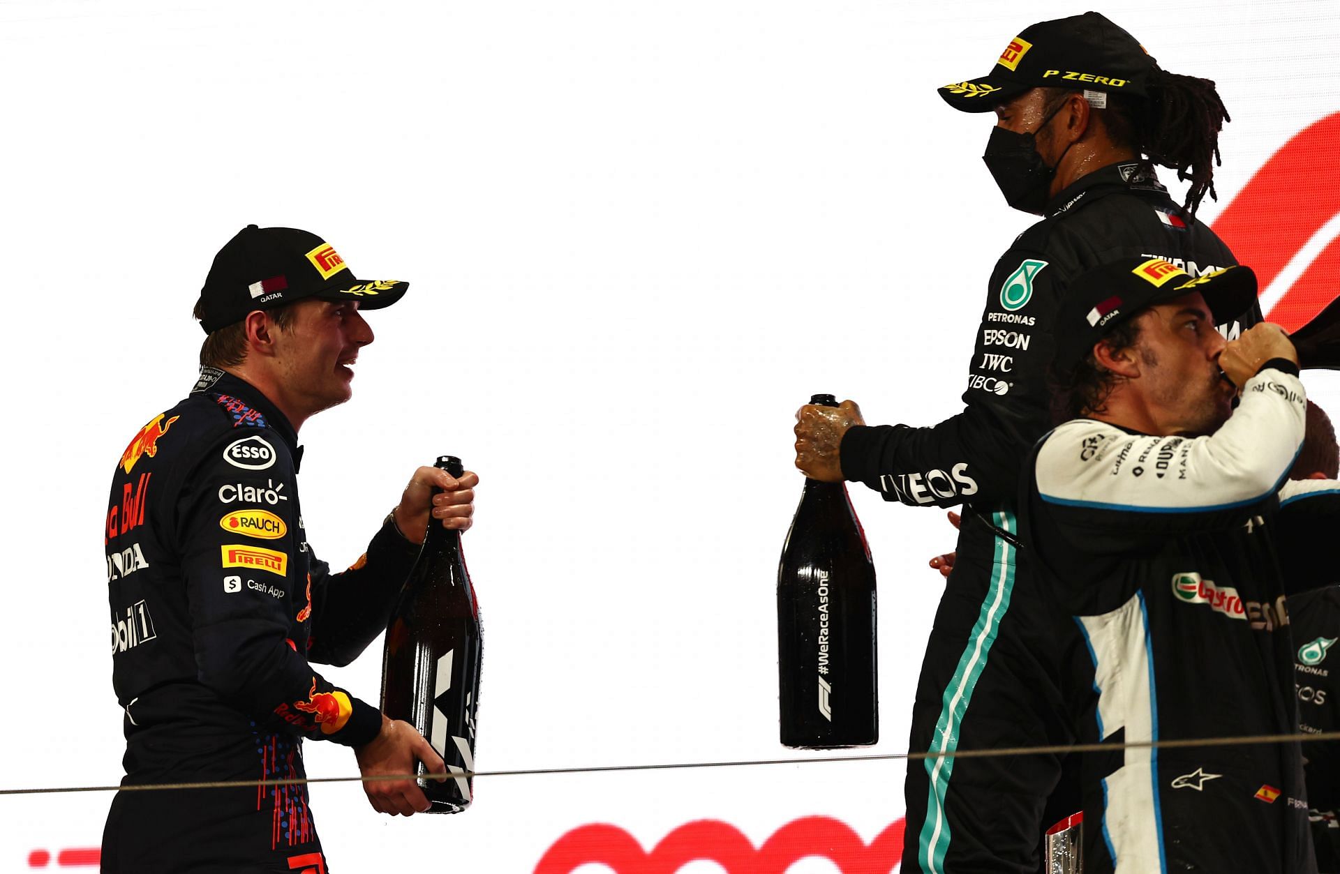 Max Verstappen speaking to Lewis Hamilton at the podium in Qatar. (Photo by Mark Thompson/Getty Images)