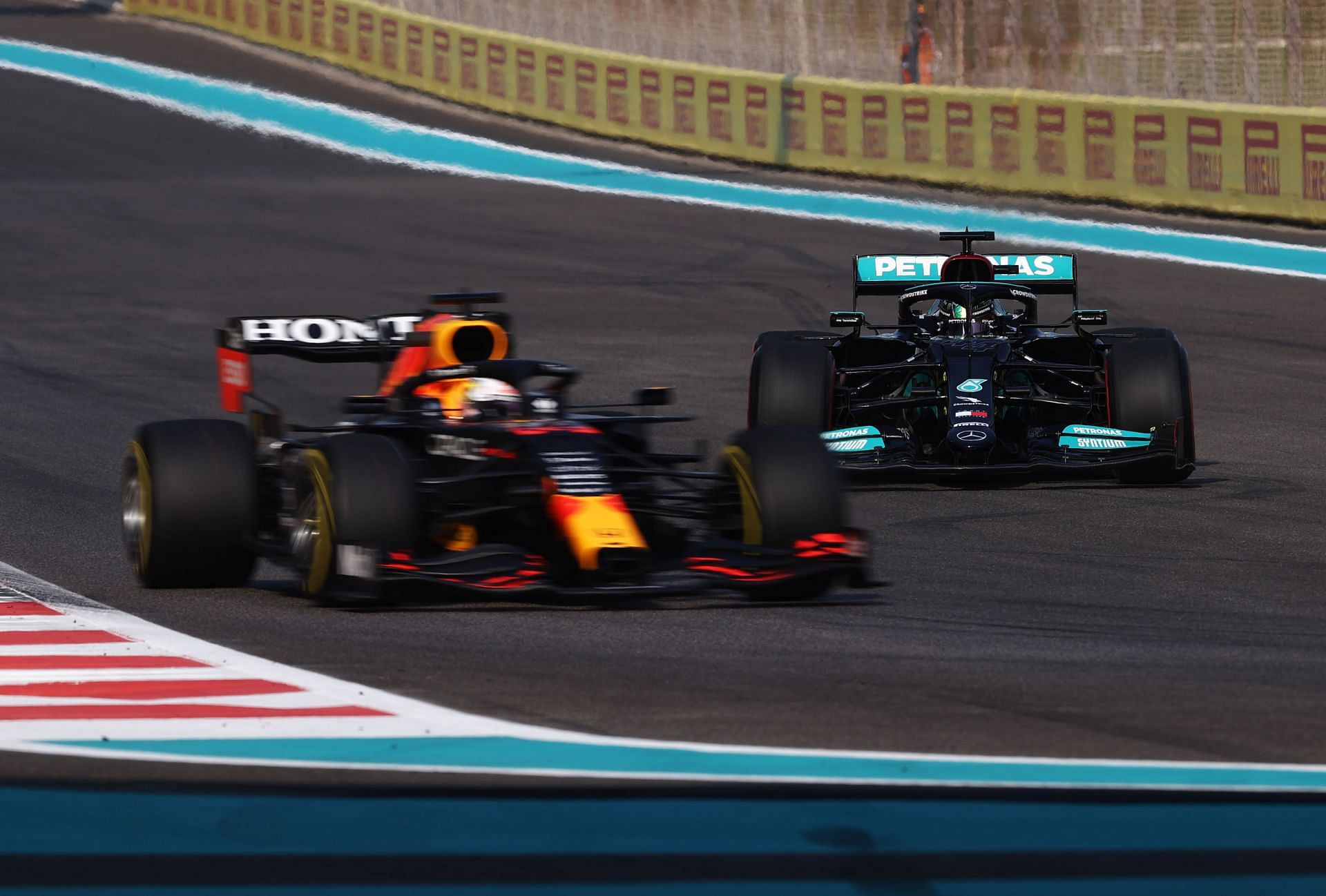 Lewis Hamilton follows Max Verstappen during final practice ahead of the 2021 Abu Dhabi Grand Prix.