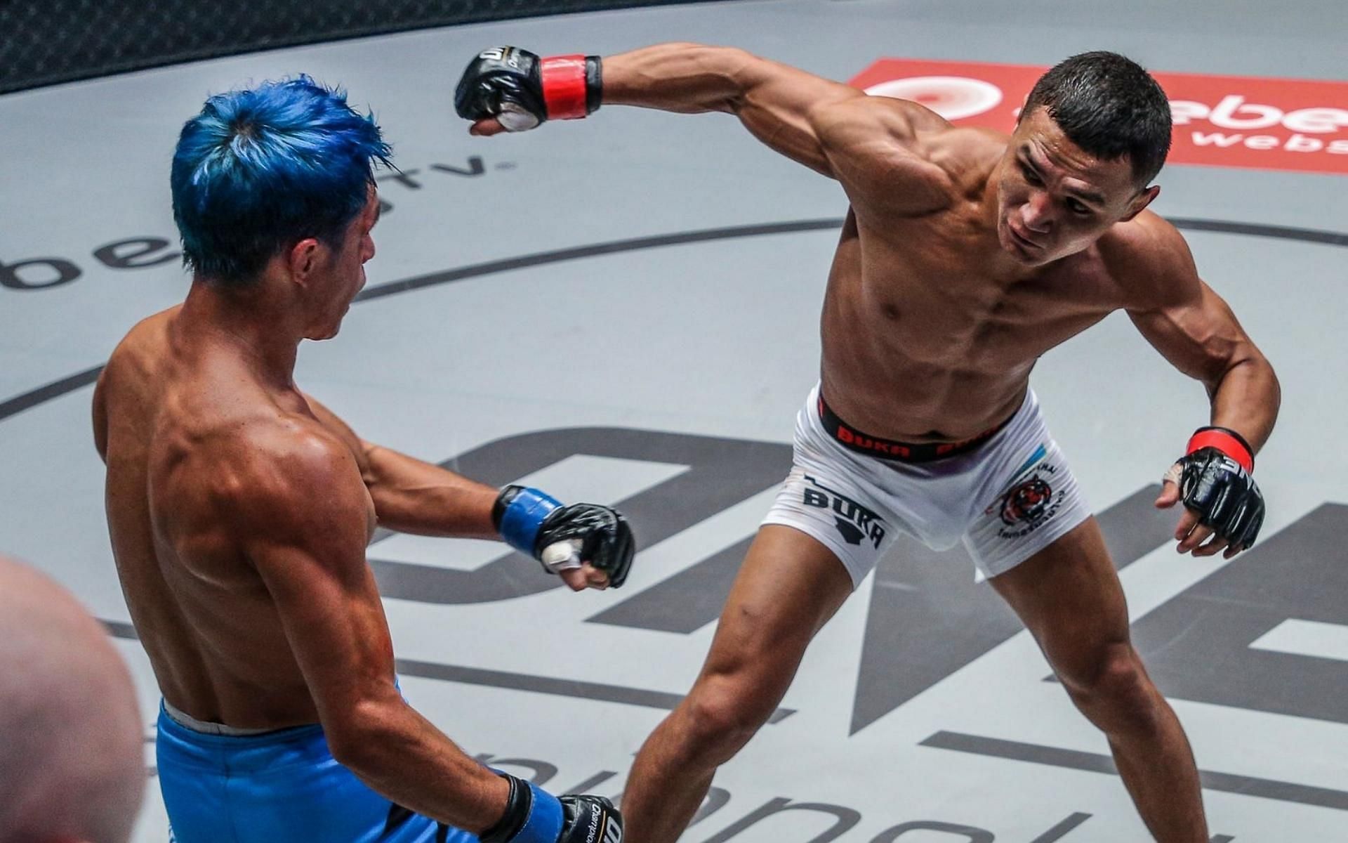 Former ONE Championship flyweight world champ Kairat Akhmetov (right) fights in the main event of ONE: Winter Warriors II. (Image courtesy of ONE Championship)