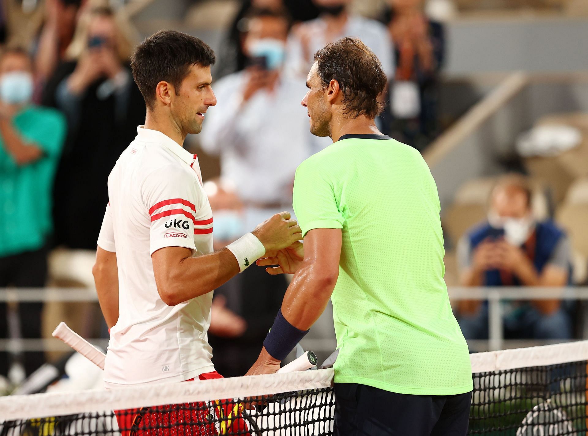 Novak Djokovic and Rafael Nadal shake hands after their classic 2021 Roland Garros semifinal