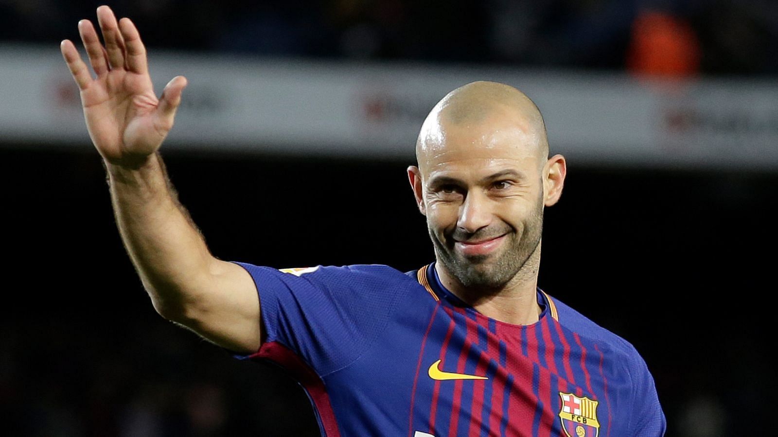 Javier Mascherano waving to Barcelona fans before his final game