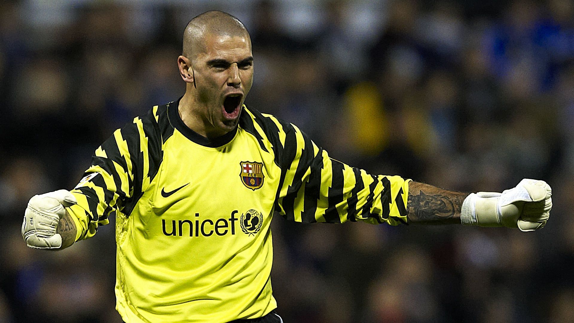 Victor Valdes passionately celebrating a goal scored by his team