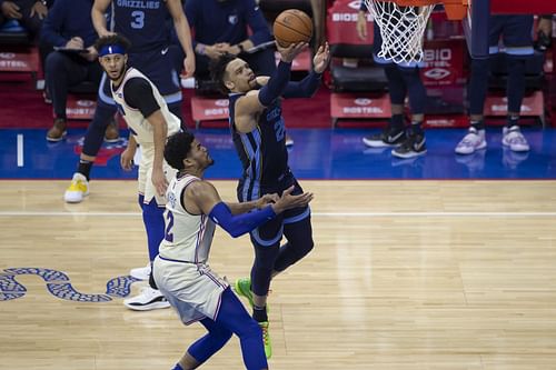 Dillon Brooks of the Memphis Grizzlies shoots against Tobias Harris of the Philadelphia 76ers