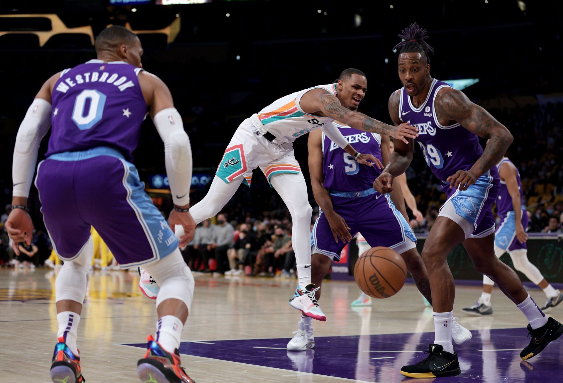 Dwight Howard (R) and Russell Westbrook of the LA Lakers in action against the San Antonio Spurs